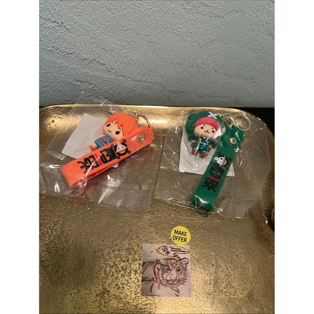 #2136**One Piece: Anime Character Keychain Strap - Orange or Green